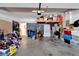 Attached garage with overhead storage and ample space for parking and storage at 13951 Caden Glen Dr, Hudson, FL 34669