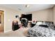 Bright bedroom with a double bed, desk, and TV at 13951 Caden Glen Dr, Hudson, FL 34669