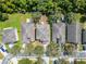 Aerial view of a row of houses in a residential community at 13951 Caden Glen Dr, Hudson, FL 34669