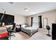 Bedroom with a modern home office setup at 13951 Caden Glen Dr, Hudson, FL 34669
