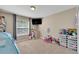 bedroom with toys and play area at 13951 Caden Glen Dr, Hudson, FL 34669