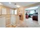 Upstairs hallway showcasing bedrooms and a home office at 13951 Caden Glen Dr, Hudson, FL 34669