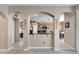 Open kitchen with granite countertops and a breakfast bar at 13951 Caden Glen Dr, Hudson, FL 34669