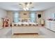 Main bedroom with king-size bed and neutral decor at 13951 Caden Glen Dr, Hudson, FL 34669