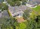 Aerial view of house and backyard in residential area at 13951 Caden Glen Dr, Hudson, FL 34669