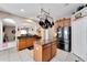 Island kitchen with granite countertops and stainless steel appliances at 13951 Caden Glen Dr, Hudson, FL 34669