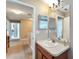 Simple bathroom with a single sink and medicine cabinet at 13951 Caden Glen Dr, Hudson, FL 34669