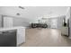 Open living room with hardwood floors and modern furniture at 5805 8Th Avenue W Dr, Bradenton, FL 34209