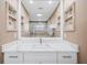 Bathroom with a vanity featuring a marble countertop at 5805 8Th Avenue W Dr, Bradenton, FL 34209
