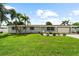 Charming ranch home with well-manicured lawn and landscaping at 5805 8Th Avenue W Dr, Bradenton, FL 34209