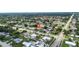 Aerial view showing home's location in a residential neighborhood at 5805 8Th Avenue W Dr, Bradenton, FL 34209