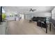 Bright living room featuring hardwood floors and a modern fireplace at 5805 8Th Avenue W Dr, Bradenton, FL 34209