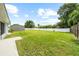 Large backyard with grassy area and storage shed at 5805 8Th Avenue W Dr, Bradenton, FL 34209