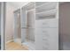 Large walk-in closet with double hanging rods and drawers at 5805 8Th Avenue W Dr, Bradenton, FL 34209