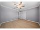 Spacious bedroom with double door closet and wood-look flooring at 5805 8Th Avenue W Dr, Bradenton, FL 34209