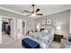 Main bedroom with ensuite bathroom and walk-in closet at 15641 Aurora Lake Cir, Wimauma, FL 33598