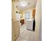 Laundry room with washer, dryer, and walk-in shower at 14141 11Th St, Dade City, FL 33525