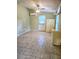 Spacious bedroom with tile floors and ceiling fan at 14141 11Th St, Dade City, FL 33525