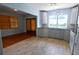 Dining area with hardwood and tile floors, and French doors at 14141 11Th St, Dade City, FL 33525
