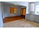 Light-filled dining area with hardwood and tile floors at 14141 11Th St, Dade City, FL 33525