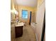Clean bathroom with bathtub and sink vanity at 14141 11Th St, Dade City, FL 33525