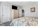 Bright bedroom with a comfortable bed and plenty of closet space at 33668 Willow Point Ct, Wesley Chapel, FL 33545