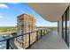 This condo boasts a spacious balcony with stunning city views and glass railings at 2912 Santiago St # 1201, Tampa, FL 33629