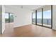 Spacious bedroom features hardwood floors and large windows, filling the room with light at 2912 Santiago St # 1201, Tampa, FL 33629
