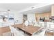 Bright dining area with modern table, seating for ten, and contemporary decor at 2912 Santiago St # 1201, Tampa, FL 33629
