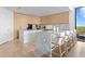 Bright and spacious kitchen with an island, sleek cabinets, stainless appliances, and breakfast bar at 2912 Santiago St # 1201, Tampa, FL 33629