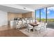 Gourmet kitchen and dining area with custom cabinets, marble countertops, and floor-to-ceiling windows at 2912 Santiago St # 1201, Tampa, FL 33629