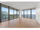 Bright living room featuring floor-to-ceiling windows with scenic city and water views at 2912 Santiago St # 1201, Tampa, FL 33629