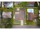 Aerial view of the house and surrounding neighborhood at 15635 Bear Creek Dr, Tampa, FL 33624