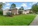 House front and yard view at 15635 Bear Creek Dr, Tampa, FL 33624