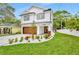 Two-story house with white siding and landscaping at 1105 Conant Ave, Safety Harbor, FL 34695