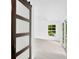 Bedroom with light wood flooring and sliding glass doors at 1105 Conant Ave, Safety Harbor, FL 34695
