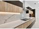 Modern kitchen with marble countertops and stainless steel appliances at 1105 Conant Ave, Safety Harbor, FL 34695