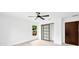 Charming bedroom with ceiling fan and a window at 1105 Conant Ave, Safety Harbor, FL 34695