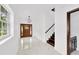 Bright entryway with marble floors and a staircase at 1105 Conant Ave, Safety Harbor, FL 34695