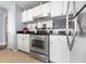 Well-equipped kitchen with white cabinets and stainless steel appliances at 501 Knights Run Ave # 2120, Tampa, FL 33602