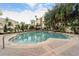 Community pool with plenty of lounge chairs for relaxing at 501 Knights Run Ave # 2120, Tampa, FL 33602