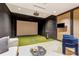 State-of-the-art golf simulator room with seating at 2912 Santiago St # 1201, Tampa, FL 33629