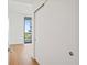 Hallway with sliding door and view into bedroom at 2912 Santiago St # 1201, Tampa, FL 33629