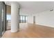 Spacious living room with hardwood floors and floor-to-ceiling windows at 2912 Santiago St # 1201, Tampa, FL 33629