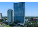 Aerial view of a modern high rise building next to a classic building at 2912 Santiago St # 1201, Tampa, FL 33629