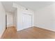 Bright bedroom with hardwood floors and access to hallway at 2912 Santiago St # 1201, Tampa, FL 33629