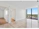 Bright bedroom with hardwood floors and city views at 2912 Santiago St # 1201, Tampa, FL 33629