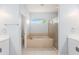 Relaxing bathroom with soaking tub, separate shower, and double vanity at 1839 Sunrise Dunes Ct, Tarpon Springs, FL 34689