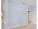 Spacious bedroom with light blue walls and wood-look floors at 1839 Sunrise Dunes Ct, Tarpon Springs, FL 34689