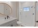 Modern bathroom with white subway tiles and frameless shower at 13029 Paddock Wood Pl, Riverview, FL 33579